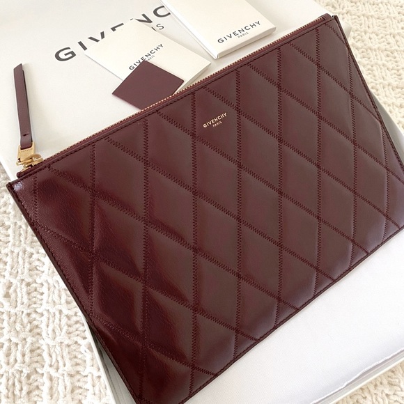 Givenchy Handbags - ❌SOLD❌NWT Givenchy Quilted Pouch, Aubergine